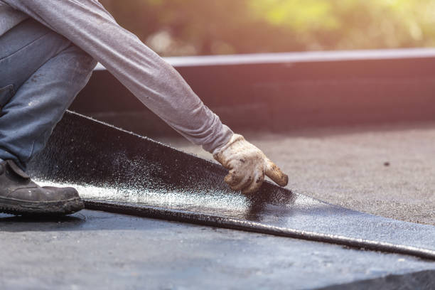 Professional Waterproofing technician working in Oakdale, MN